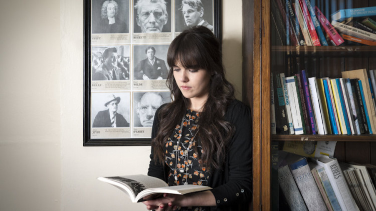 Student reading in a seminar class, University of Liverpool, 2019.